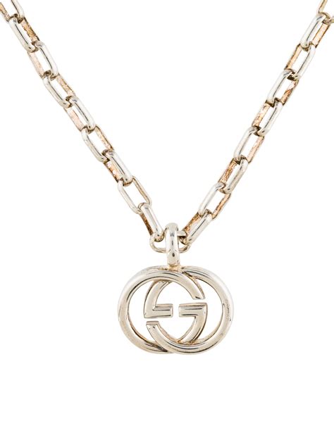 gucci logo necklace.